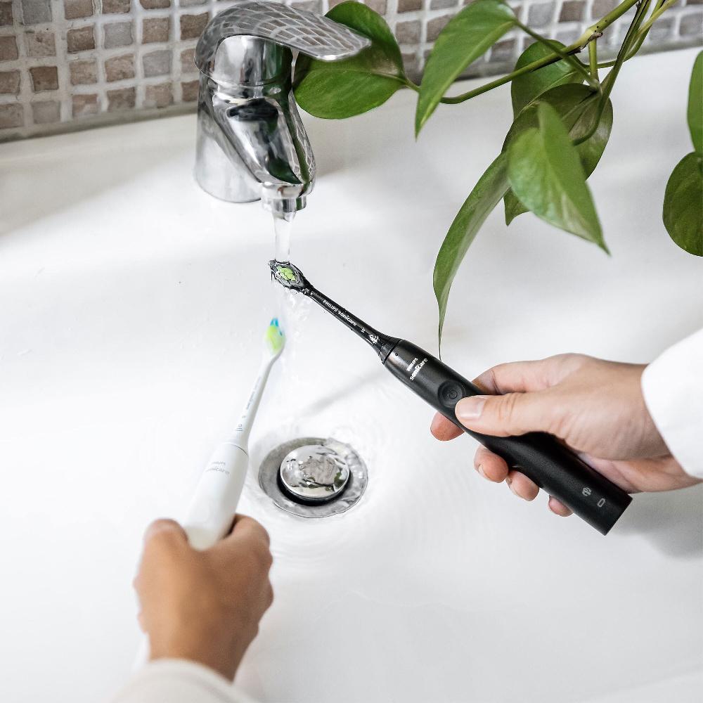 QVC Philips Spazzolino elettrico Serie 4100 + 5 testine di ricambio Offerta speciale