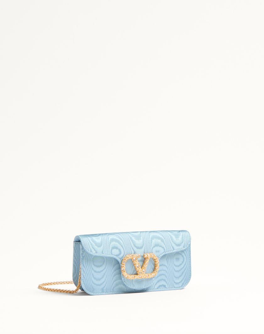 Valentino Handbags Clutch Valentino Garavani Locò In Tessuto Moiré Con Logo Gioiello per Donna in Nero/crystal | Valentino IT Nuova