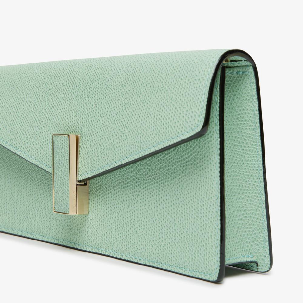Valextra Borsetta clutch in Pelle con tracolla dorata | Valextra Iside 2025