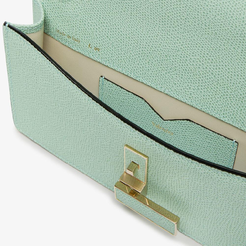 Valextra Borsetta clutch in Pelle con tracolla dorata | Valextra Iside 2025