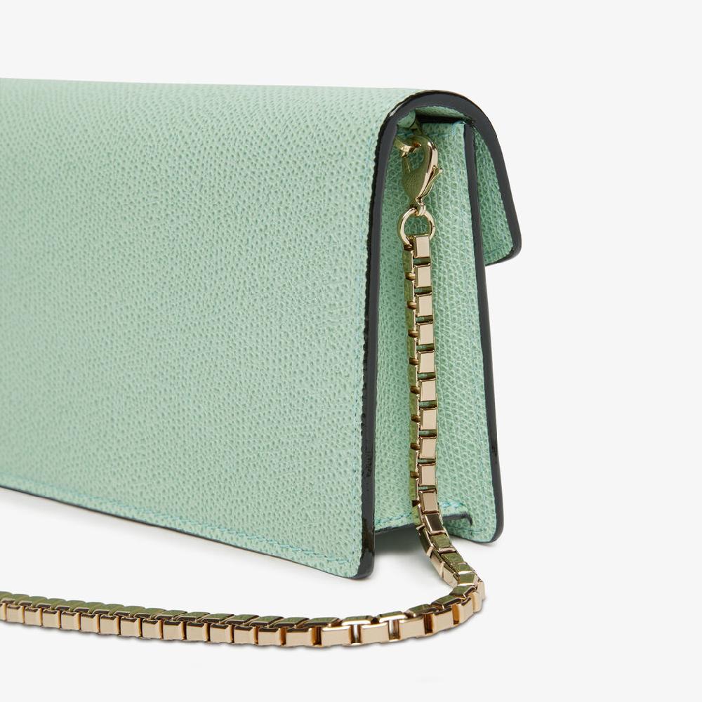 Valextra Borsetta clutch in Pelle con tracolla dorata | Valextra Iside 2025